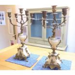 A pair of five-branch candelabra with onyx bases, in good condition (44cm high)