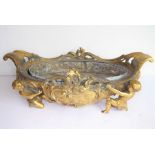 A heavy 18th century style gilt-metal two-handled boat-shaped jardiniere; with original liner,