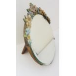 A Barbola-style mirror crested with flowers and having an easel-style back, circa 1930s (26cm