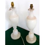 A pair of baluster-shaped alabaster table lamps; approximately (39cm high excluding electrical