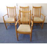 A good set of four Ercol elm armchairs, each chair with turned front verticals united by an H-form