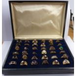 A cased batch of 36 silver-gilt fashion rings mostly set with cut stones