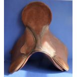 A child's brown-leather saddle (possibly by Clifford Barnes)