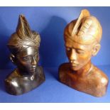 Two well-carved Eastern wooden busts (the taller 26cm high)