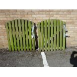 A pair of slatted wooden gates with latches and hinges (each approx. 91cm wide x 109cm high)