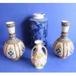 A pair of late 19th century Mettlach-style vases of baluster form, each typically decorated with