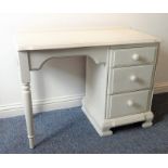 A painted dressing table having three graduated drawers and galleried back (103cm wide x 46cm deep x