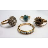 Four 9-carat gold stone-set rings; ring sizes M/N, O, I/J, L (total weight 10.13g) (The cost of UK