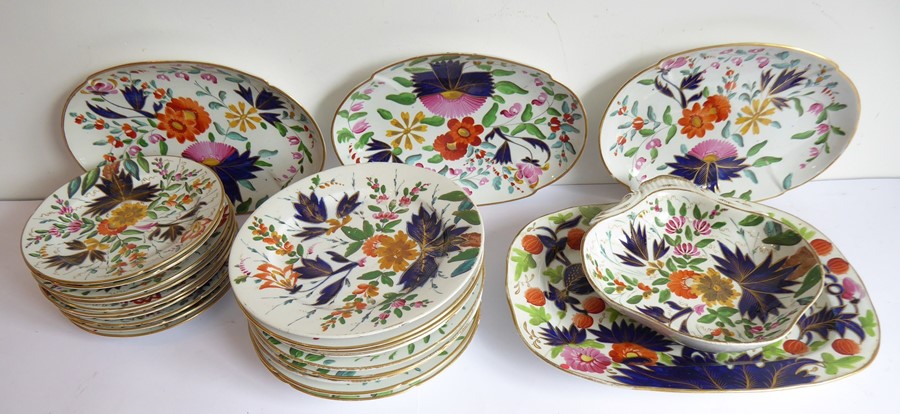 An early 19th century English porcelain part dessert service comprising four oval platters (34.5cm