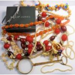 A small selection of mostly costume jewellery; to include a coral necklace, a glass necklace (as