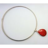 A silver-mounted teardrop-shaped polished red and mother of pearl style natural hardstone