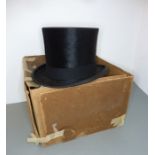 A good Tress & Co silk top hat, its carboard box in poor condition Hat size is approx. 54.5cm
