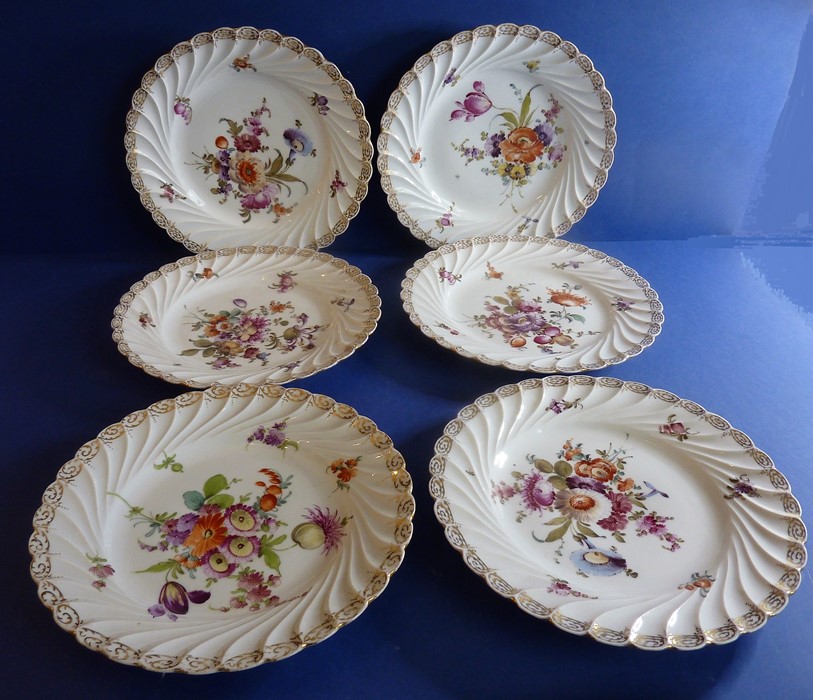 A set of six early 20th century fine quality Dresden porcelain side dishes; each with gilded and