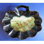 A 19th century scallop-shell-shaped pȃpier-maché crumb-tray hand-decorated in oils with a fox-