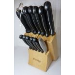 A used set of Prestige chef's knives (one all-metal replacement knife)