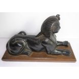 A good late 19th century spelter model of a sphinx on an oak plinth base, good patination  (28.5cm