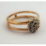 A 9-carat gold diamond cluster ring; ring size N (total weight 2.43g) (The cost of UK postage via