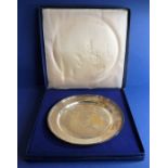A hallmarked silver limited edition plate produced to commemorate the 1977 Silver Jubilee (boxed)