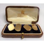 A boxed pair of gold cufflinks (8g) (The cost of UK postage via Royal Mail Special Delivery for this