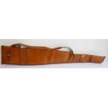 A faux leather shotgun slip