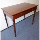 A Regency period mahogany and satinwood cross-banded writing table, two half-width drawers raised on