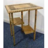 An unusual late 19th/early 20th century pine side table; the overhanging top carved with various