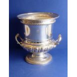 A heavy two-handled silver-plated wine cooler of campana form Condition report - the copper does not