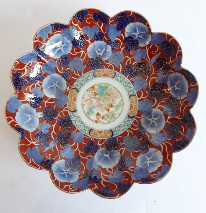 A Japanese flower-head shaped porcelain dish hand-gilded and decorated in the Imari palette, three- - Image 2 of 5