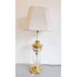 A large cut-glass and gilt-brass table lamp