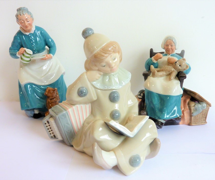 Two Royal Doulton figures: 'Nanny' (HN2221) and 'The Favourite' (NH2249), together with a Lladro