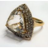 A fancy stone-set 9-carat gold dress ring; ring size N/O (total weight 3.78g) (The cost of UK
