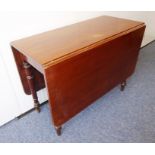 A mid-19th century mahogany drop-leaf dining table, raised on turned tapering legs (142cm (leaves