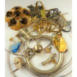 A selection of costume and silver jewellery to include brooches, earrings, pendants and chains