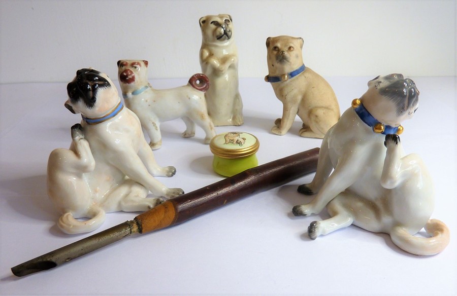 A small selection of mostly late 19th / early 20th century ceramic pugs to include an opposing