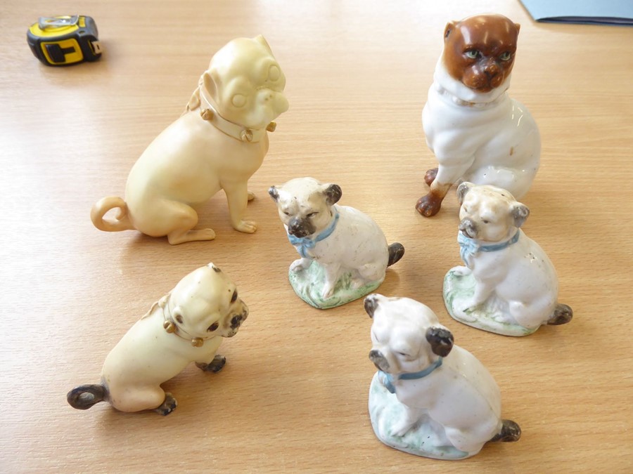 Sixteen, mostly small, decorative ceramic pug dogs and bulldogs to include a 19th century 'basket' - Image 4 of 5