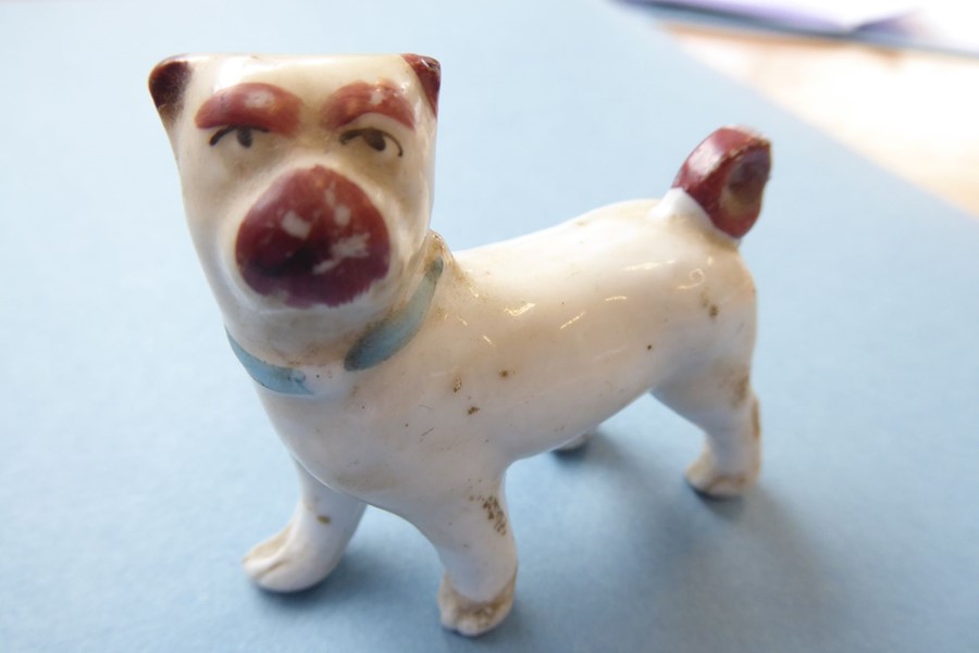 A small selection of mostly late 19th / early 20th century ceramic pugs to include an opposing - Image 13 of 20