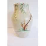 A large hand-thrown Clarice Cliff vase (25cm high) The item is not perfect we have taken extra