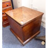 A 19th century patinated box (probably elm) with hinged lid and plinth base (52cm wide) Dimensions
