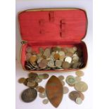An interesting selection of worldwide coinage and badges together with a large and heavy silver