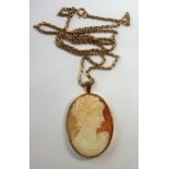 A 9-carat gold-mounted cameo pendant and 9-carat gold chain (total weight 23g) (The cost of UK