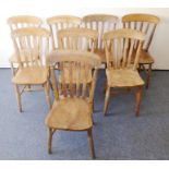 A set of eight kitchen-style lathe-back chairs having elm seats