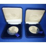 Two identical commemorative white-metal medallions; 'Sir Anthony Panizzi 1797-1879' to the obverse