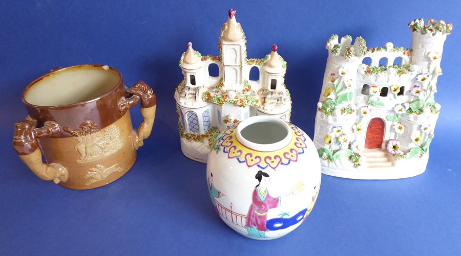 Two 19th century Staffordshire pottery flatback spill models, one modelled as a castle with two