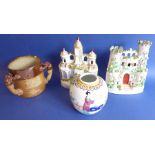 Two 19th century Staffordshire pottery flatback spill models, one modelled as a castle with two