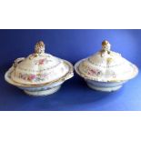 A pair of late 19th century circular two-handled tureens and covers, gilded and decorated with