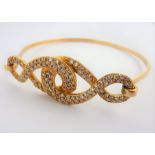 A multi-diamond set 18-carat gold bracelet (20g) (The cost of UK postage via Royal Mail Special