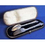 A cased hallmarked silver spoon and fork set; maker's mark GA, assayed London, probably 1854