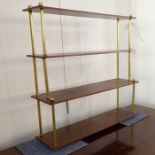 A modern set of mahogany and brass-mounted wall-hanging shelves, four graduated shelves (66cm wide x