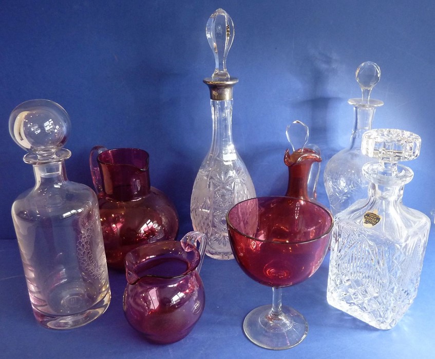 A varied selection of cranberry and clear glass; to include a fine cut-glass mallet-shaped