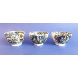 A pair of early 19th century transfer decorated and printed tea bowls together with one other